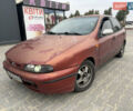 Красный Фиат Браво, объемом двигателя 1.6 л и пробегом 260 тыс. км за 1250 $, фото 1 на Automoto.ua