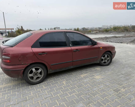 Красный Фиат Браво, объемом двигателя 1.6 л и пробегом 260 тыс. км за 1250 $, фото 7 на Automoto.ua