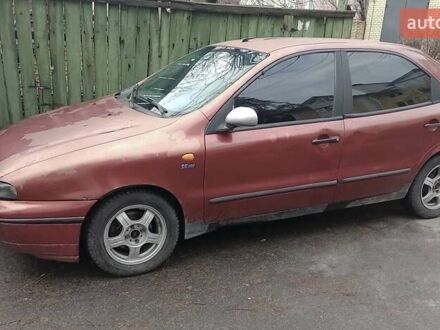 Красный Фиат Браво, объемом двигателя 1.6 л и пробегом 286 тыс. км за 750 $, фото 1 на Automoto.ua