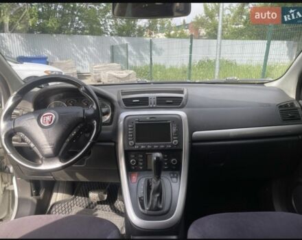 Белый Фиат Крома, объемом двигателя 1.9 л и пробегом 227 тыс. км за 4200 $, фото 2 на Automoto.ua