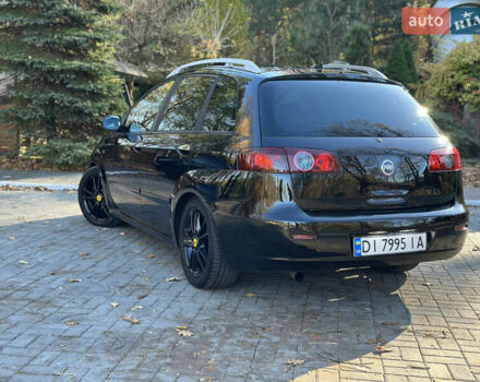 Черный Фиат Крома, объемом двигателя 2.4 л и пробегом 270 тыс. км за 4200 $, фото 24 на Automoto.ua