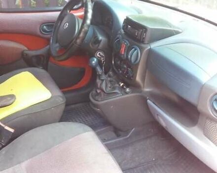 Красный Фиат Добло Панорама, объемом двигателя 1.91 л и пробегом 394 тыс. км за 4200 $, фото 7 на Automoto.ua