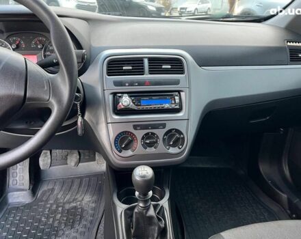 Білий Фіат Гранде Пунто, об'ємом двигуна 1.4 л та пробігом 76 тис. км за 6890 $, фото 25 на Automoto.ua