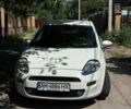 Белый Фиат Гранде Пунто, объемом двигателя 1.37 л и пробегом 110 тыс. км за 5300 $, фото 1 на Automoto.ua