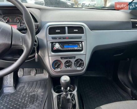 Білий Фіат Гранде Пунто, об'ємом двигуна 1.4 л та пробігом 76 тис. км за 6890 $, фото 25 на Automoto.ua