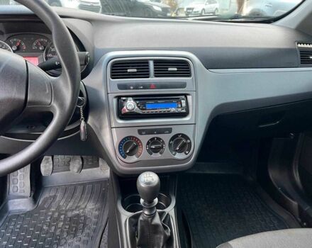 Білий Фіат Гранде Пунто, об'ємом двигуна 1.4 л та пробігом 76 тис. км за 6890 $, фото 21 на Automoto.ua