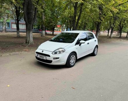 Белый Фиат Гранде Пунто, объемом двигателя 1.4 л и пробегом 168 тыс. км за 5600 $, фото 1 на Automoto.ua
