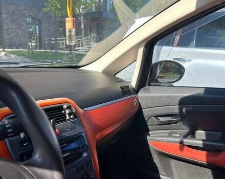 Черный Фиат Гранде Пунто, объемом двигателя 1.37 л и пробегом 200 тыс. км за 3700 $, фото 6 на Automoto.ua