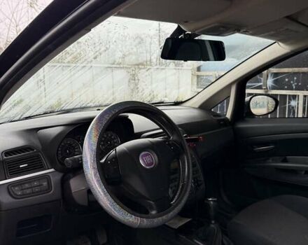 Черный Фиат Гранде Пунто, объемом двигателя 1.37 л и пробегом 156 тыс. км за 4000 $, фото 11 на Automoto.ua