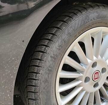 Чорний Фіат Гранде Пунто, об'ємом двигуна 1.37 л та пробігом 187 тис. км за 4300 $, фото 9 на Automoto.ua