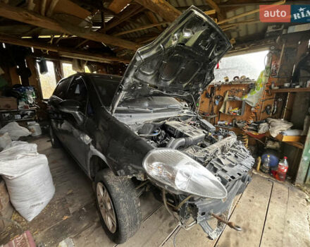 Черный Фиат Гранде Пунто, объемом двигателя 1.37 л и пробегом 250 тыс. км за 1500 $, фото 1 на Automoto.ua