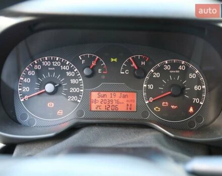 Красный Фиат Гранде Пунто, объемом двигателя 1.37 л и пробегом 203 тыс. км за 4400 $, фото 17 на Automoto.ua