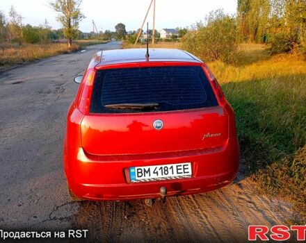 Красный Фиат Гранде Пунто, объемом двигателя 1.4 л и пробегом 207 тыс. км за 3600 $, фото 3 на Automoto.ua