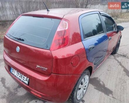 Червоний Фіат Гранде Пунто, об'ємом двигуна 1.24 л та пробігом 126 тис. км за 2200 $, фото 17 на Automoto.ua