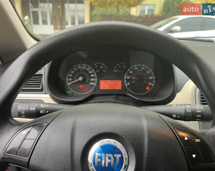 Червоний Фіат Гранде Пунто, об'ємом двигуна 1.37 л та пробігом 308 тис. км за 3900 $, фото 13 на Automoto.ua