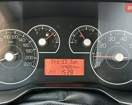 Червоний Фіат Гранде Пунто, об'ємом двигуна 1.37 л та пробігом 145 тис. км за 4800 $, фото 20 на Automoto.ua