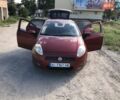 Красный Фиат Гранде Пунто, объемом двигателя 1.37 л и пробегом 185 тыс. км за 3800 $, фото 1 на Automoto.ua