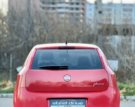 Красный Фиат Гранде Пунто, объемом двигателя 1.37 л и пробегом 139 тыс. км за 4999 $, фото 4 на Automoto.ua