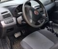 Красный Фиат Гранде Пунто, объемом двигателя 1.4 л и пробегом 78 тыс. км за 4000 $, фото 5 на Automoto.ua