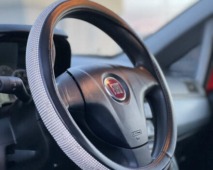 Красный Фиат Гранде Пунто, объемом двигателя 1.37 л и пробегом 139 тыс. км за 4999 $, фото 7 на Automoto.ua