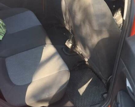 Красный Фиат Гранде Пунто, объемом двигателя 1.37 л и пробегом 147 тыс. км за 5600 $, фото 9 на Automoto.ua