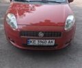 Красный Фиат Гранде Пунто, объемом двигателя 1.37 л и пробегом 147 тыс. км за 5600 $, фото 1 на Automoto.ua