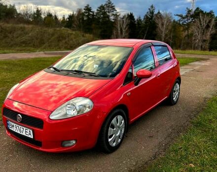 Красный Фиат Гранде Пунто, объемом двигателя 1.4 л и пробегом 208 тыс. км за 4700 $, фото 1 на Automoto.ua
