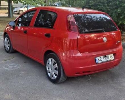 Красный Фиат Гранде Пунто, объемом двигателя 1.37 л и пробегом 147 тыс. км за 5600 $, фото 2 на Automoto.ua