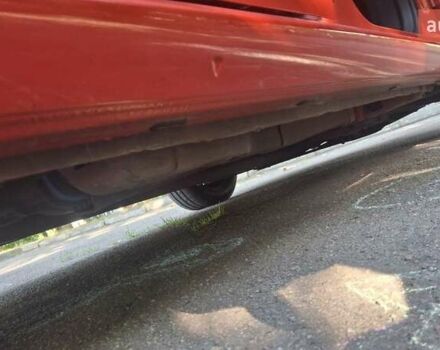 Красный Фиат Гранде Пунто, объемом двигателя 1.37 л и пробегом 147 тыс. км за 5600 $, фото 12 на Automoto.ua