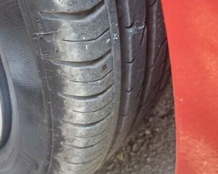 Красный Фиат Гранде Пунто, объемом двигателя 1.37 л и пробегом 147 тыс. км за 5600 $, фото 10 на Automoto.ua