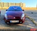 Красный Фиат Гранде Пунто, объемом двигателя 1.4 л и пробегом 84 тыс. км за 6200 $, фото 1 на Automoto.ua