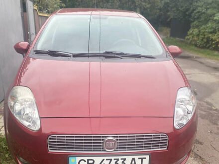 Красный Фиат Гранде Пунто, объемом двигателя 1.4 л и пробегом 57 тыс. км за 5400 $, фото 1 на Automoto.ua