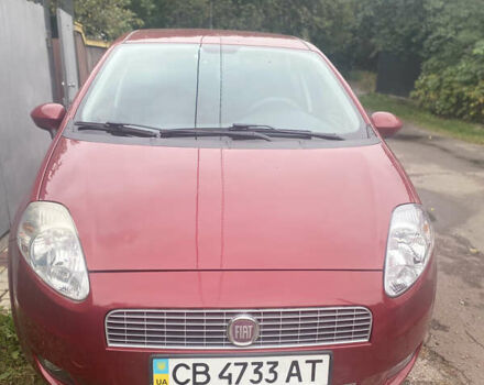Красный Фиат Гранде Пунто, объемом двигателя 1.4 л и пробегом 57 тыс. км за 5400 $, фото 1 на Automoto.ua