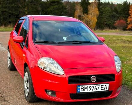 Красный Фиат Гранде Пунто, объемом двигателя 1.4 л и пробегом 208 тыс. км за 4700 $, фото 1 на Automoto.ua