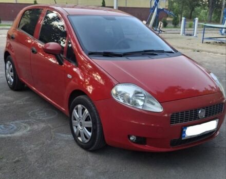 Красный Фиат Гранде Пунто, объемом двигателя 1.4 л и пробегом 147 тыс. км за 5900 $, фото 1 на Automoto.ua