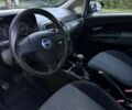 Сірий Фіат Гранде Пунто, об'ємом двигуна 1.4 л та пробігом 237 тис. км за 3499 $, фото 1 на Automoto.ua