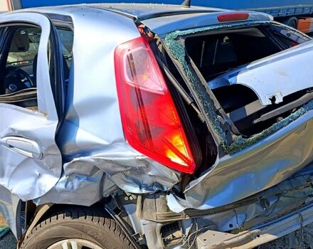 Синий Фиат Гранде Пунто, объемом двигателя 1.4 л и пробегом 260 тыс. км за 600 $, фото 7 на Automoto.ua