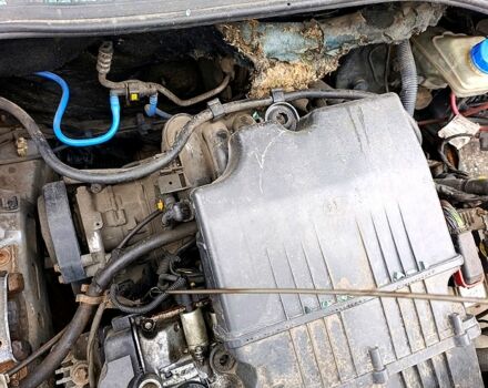 Синий Фиат Гранде Пунто, объемом двигателя 1.4 л и пробегом 260 тыс. км за 600 $, фото 4 на Automoto.ua