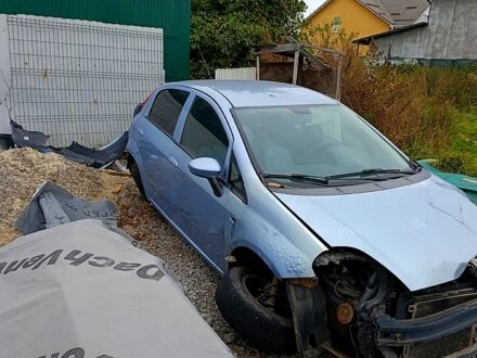 Синий Фиат Гранде Пунто, объемом двигателя 1.4 л и пробегом 260 тыс. км за 600 $, фото 1 на Automoto.ua