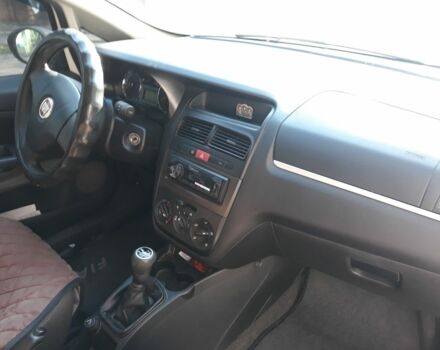 Белый Фиат Линеа, объемом двигателя 1.6 л и пробегом 267 тыс. км за 4500 $, фото 2 на Automoto.ua