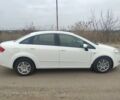 Белый Фиат Линеа, объемом двигателя 1.3 л и пробегом 115 тыс. км за 5600 $, фото 1 на Automoto.ua