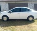 Белый Фиат Линеа, объемом двигателя 1.4 л и пробегом 158 тыс. км за 4800 $, фото 1 на Automoto.ua
