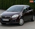 Красный Фиат Линеа, объемом двигателя 1.37 л и пробегом 149 тыс. км за 5499 $, фото 1 на Automoto.ua