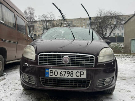 Красный Фиат Линеа, объемом двигателя 1.4 л и пробегом 194 тыс. км за 5300 $, фото 1 на Automoto.ua