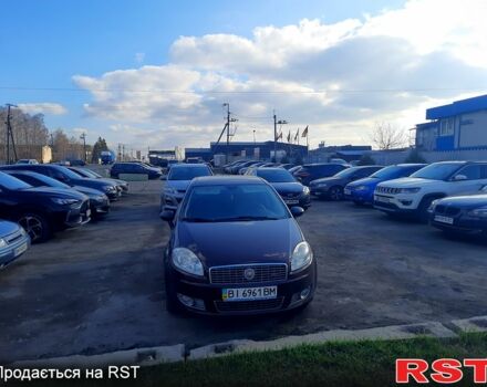 Красный Фиат Линеа, объемом двигателя 1.4 л и пробегом 17700 тыс. км за 6300 $, фото 1 на Automoto.ua