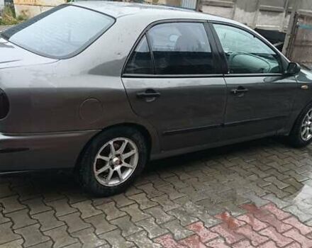 Сірий Фіат Мареа, об'ємом двигуна 1.58 л та пробігом 310 тис. км за 1900 $, фото 3 на Automoto.ua