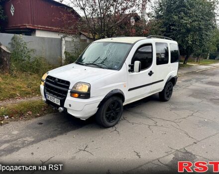 Белый Фиат Добло, объемом двигателя 1.2 л и пробегом 250 тыс. км за 3500 $, фото 1 на Automoto.ua