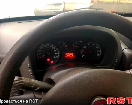 Белый Фиат Добло, объемом двигателя 1.2 л и пробегом 215 тыс. км за 2800 $, фото 3 на Automoto.ua