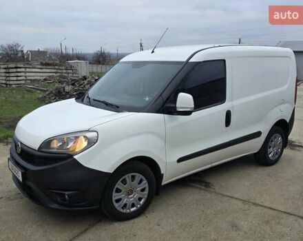 Белый Фиат Добло, объемом двигателя 1.2 л и пробегом 147 тыс. км за 7400 $, фото 1 на Automoto.ua