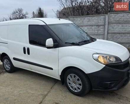 Белый Фиат Добло, объемом двигателя 1.2 л и пробегом 147 тыс. км за 7400 $, фото 2 на Automoto.ua